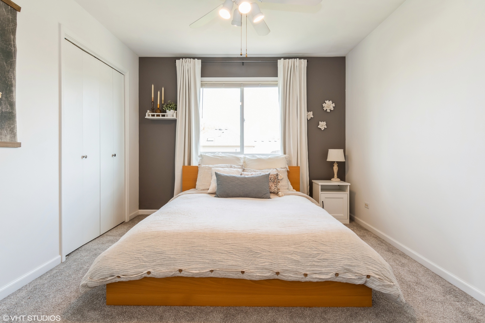 1449 Mesa Drive Bolingbrook, IL 60490 - Photo 22 of 34 a bedroom with a bed and a chandelier