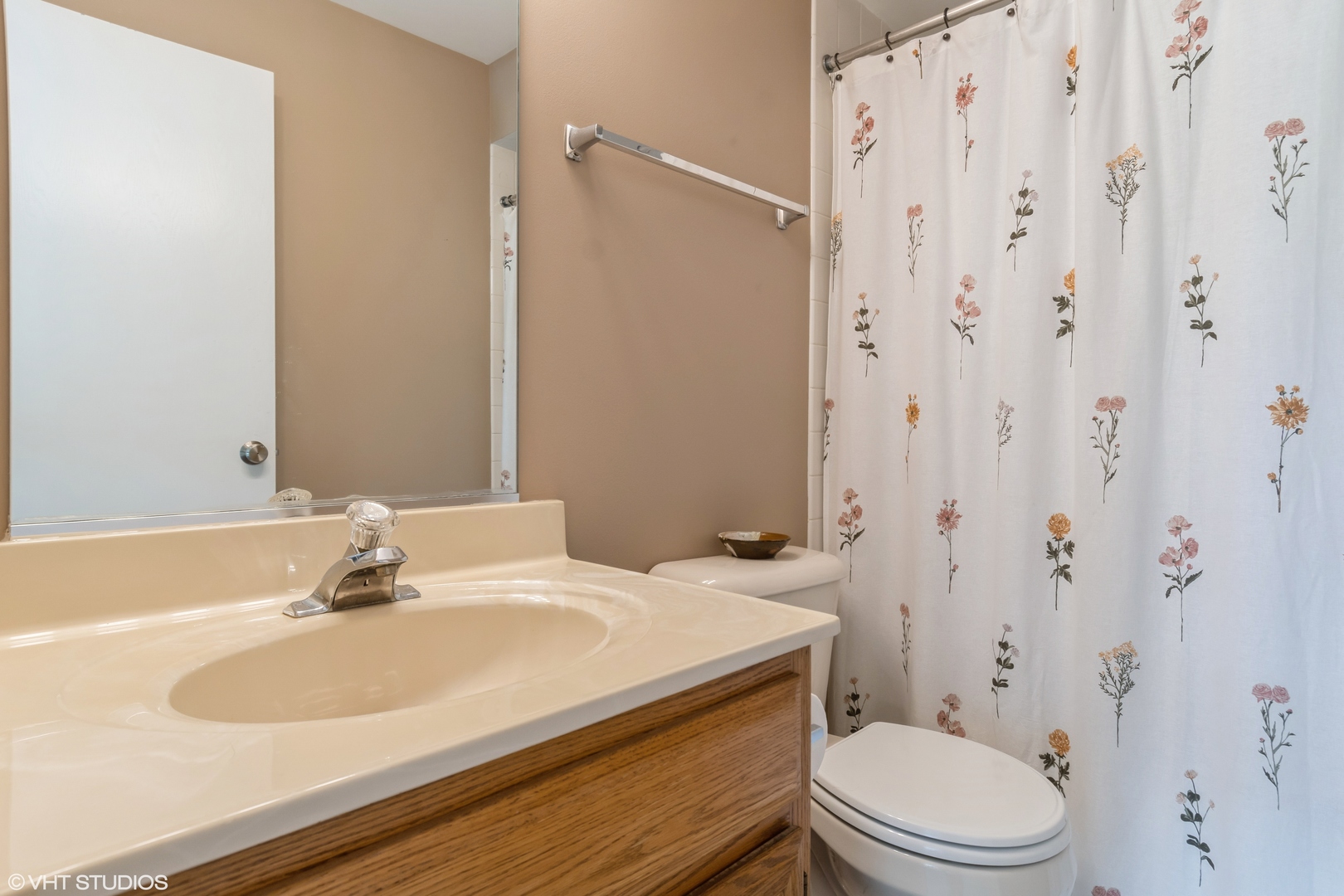 1449 Mesa Drive Bolingbrook, IL 60490 - Photo 25 of 34 a bathroom with a sink toilet and shower