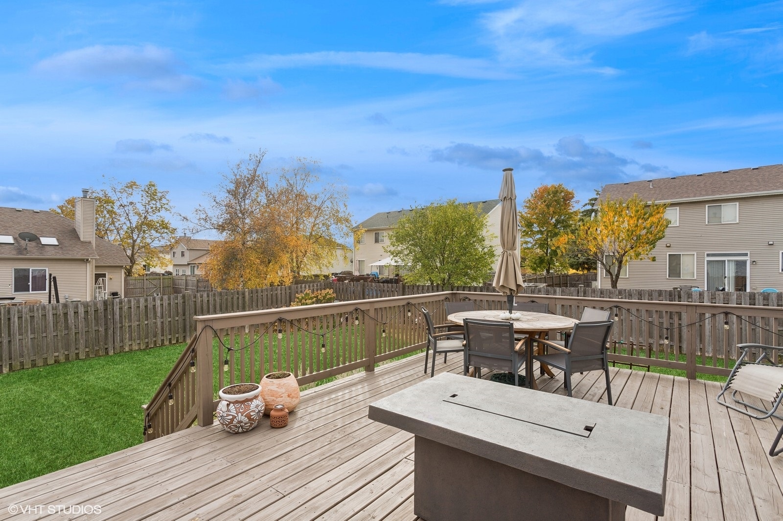 1449 Mesa Drive Bolingbrook, IL 60490 - Photo 26 of 34 a view of a roof deck with couches and sky view