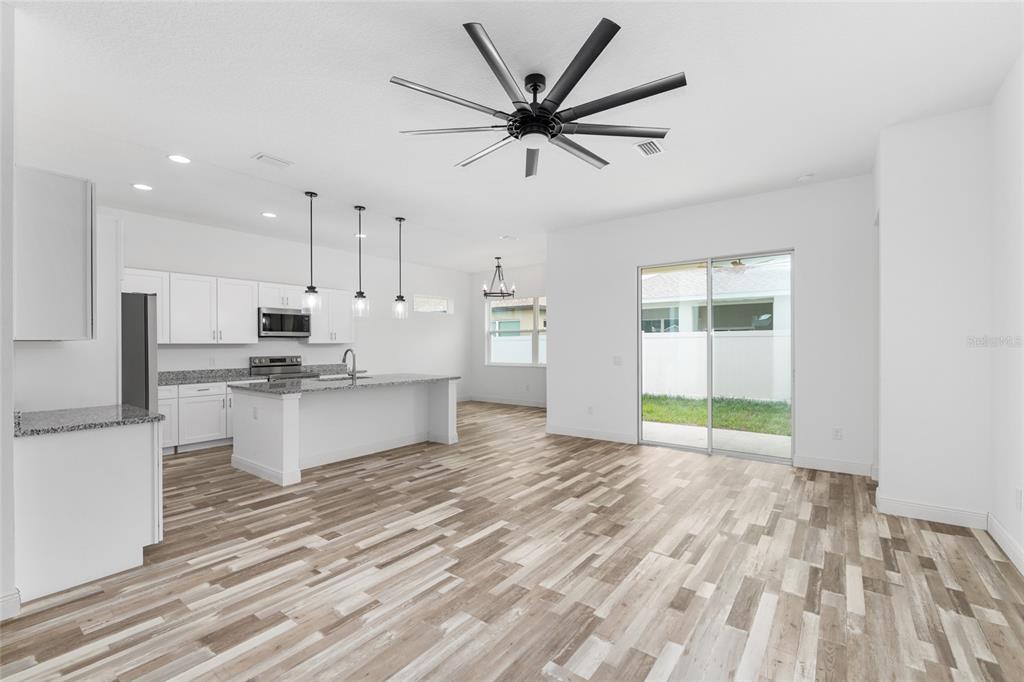 4722 Southeast 25th Loop Ocala, FL 34480 - Photo 13 of 38 a view of kitchen with sink and refrigerator