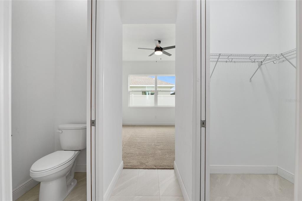 4722 Southeast 25th Loop Ocala, FL 34480 - Photo 26 of 38 a bathroom that has a toilet