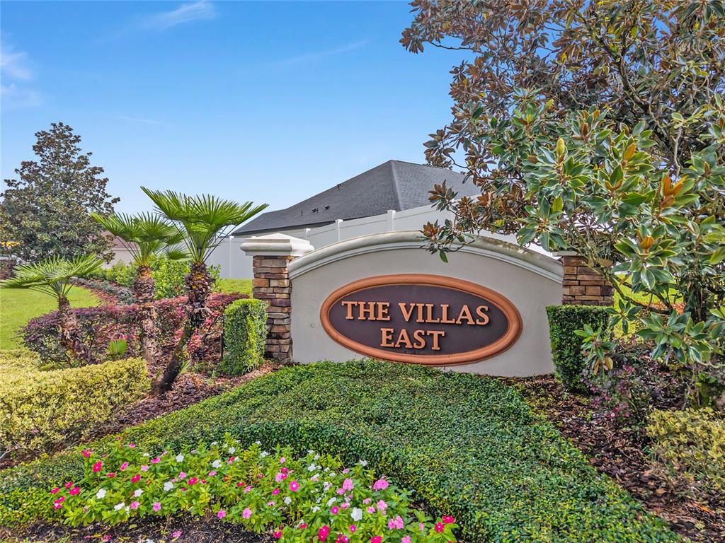 4722 Southeast 25th Loop Ocala, FL 34480 - Photo 3 of 38 a sign that is on a pole