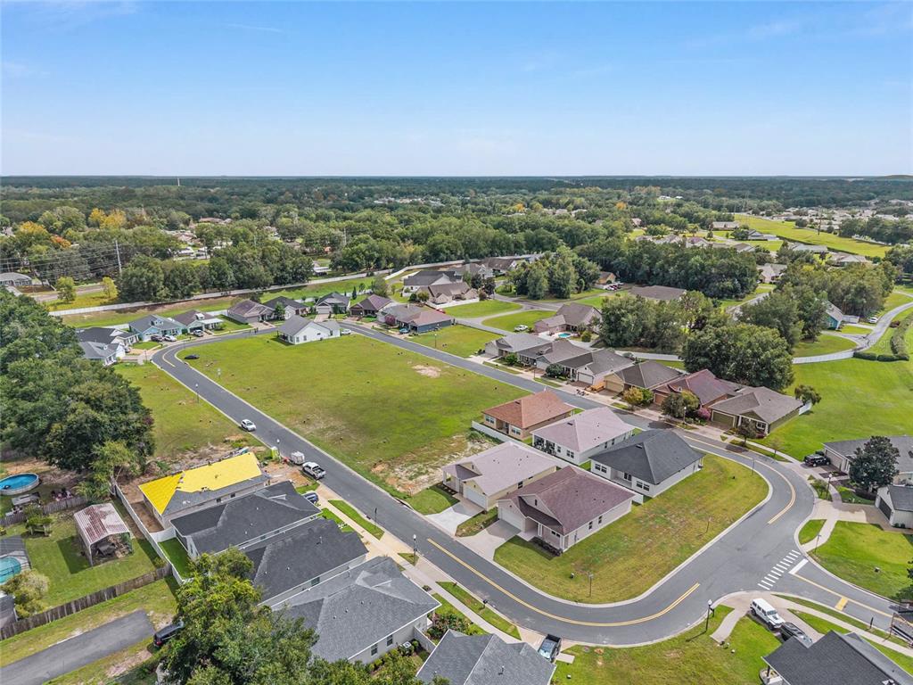 4722 Southeast 25th Loop Ocala, FL 34480 - Photo 4 of 38 an aerial view of a city