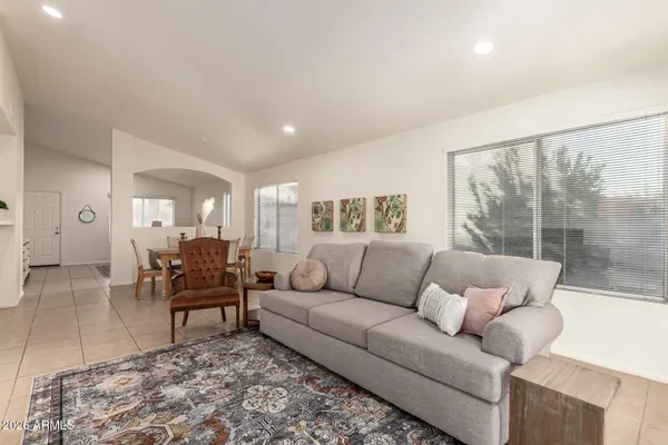 a view of a dining room with furniture window and outside view