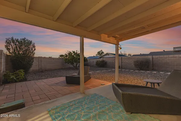 a bathroom with a shower sink vanity mirror and toilet