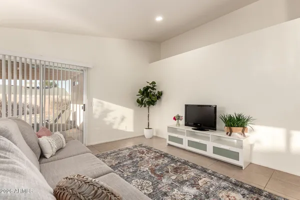 a kitchen with granite countertop sink stainless steel appliances and cabinets