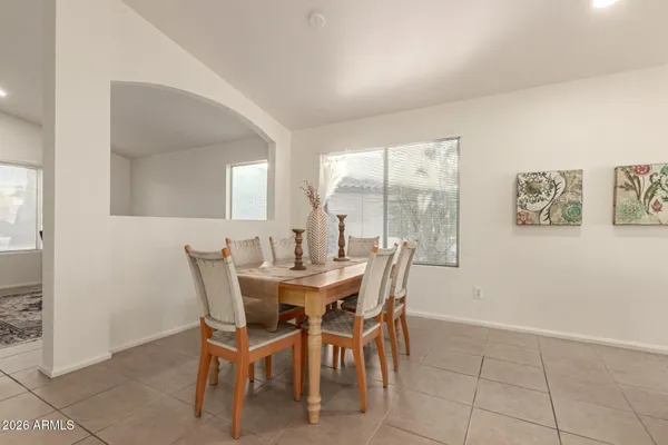 a living room with a flat screen tv and a couch