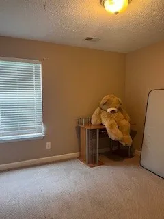 a view of a room with a window