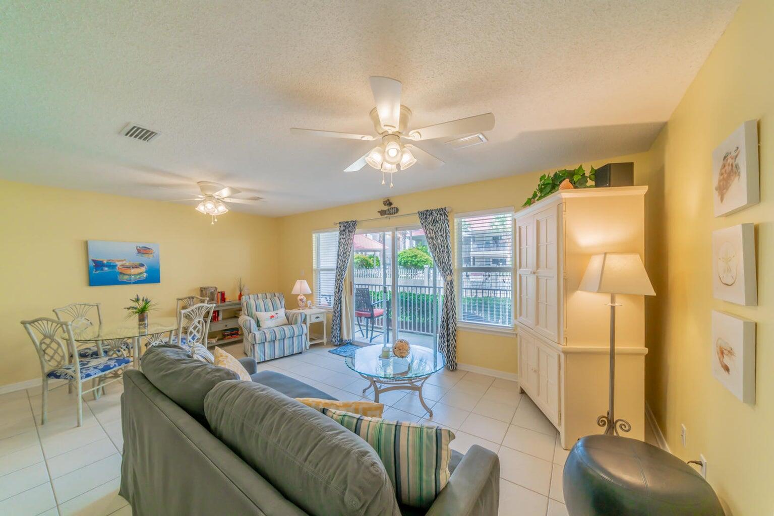 82 Sugar Sand Lane, Unit C3 Santa Rosa Beach, FL 32459 - Photo 2 of 16 a living room with furniture and a large window