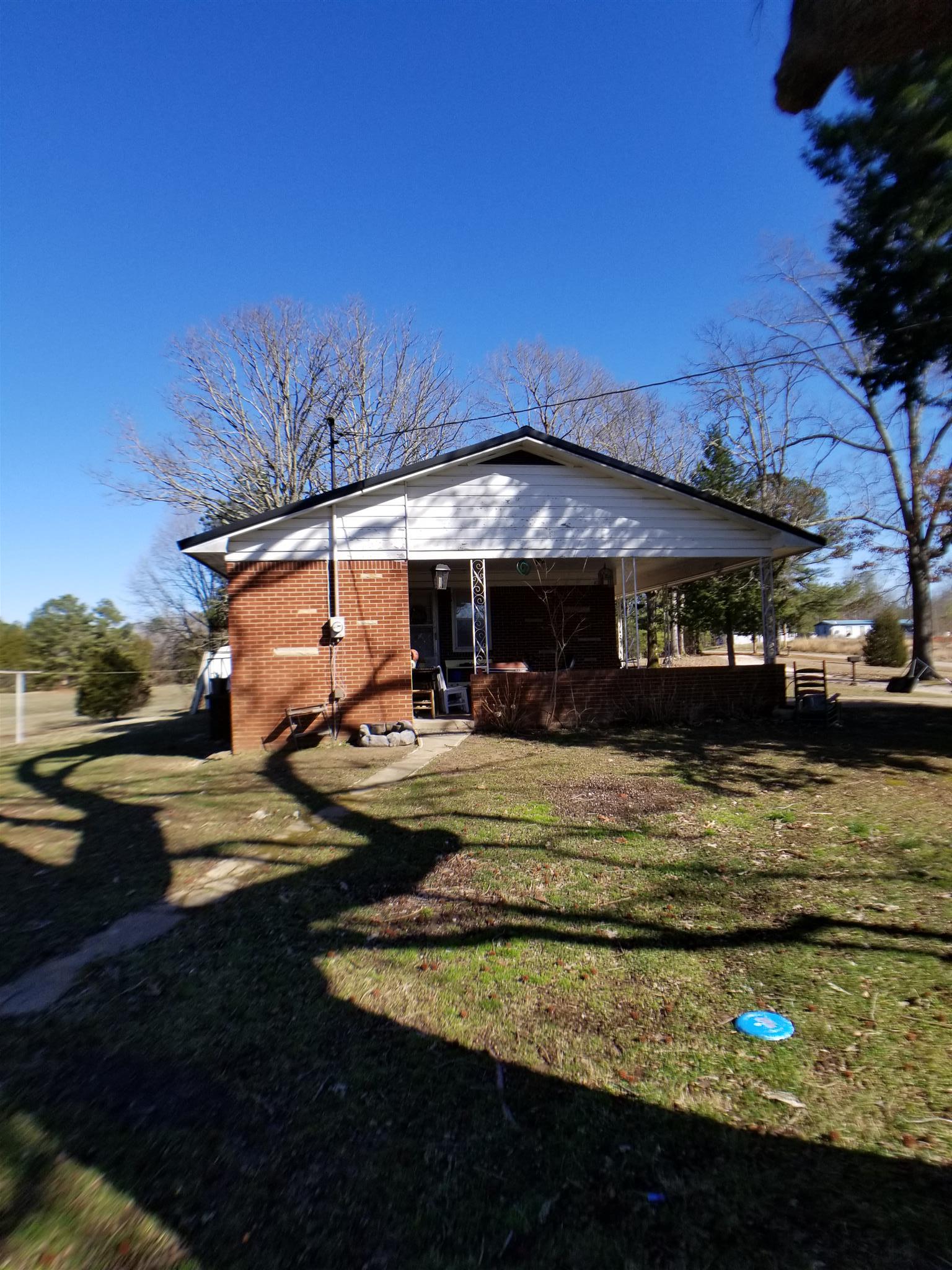 7535 Natchez Trace Road Camden, TN 38320 - Photo 2 of 22 Right Exterior with Attached Carport
