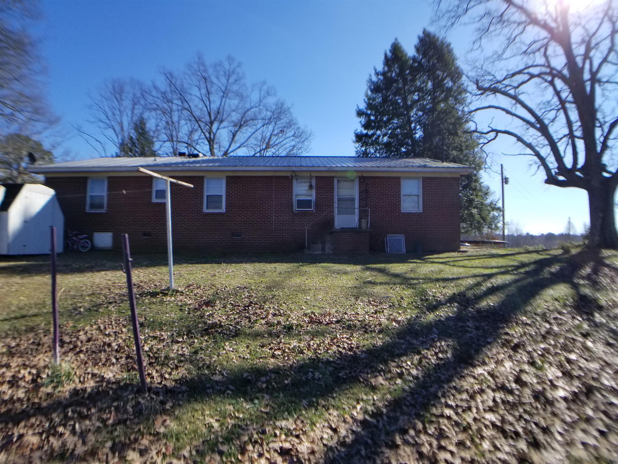 7535 Natchez Trace Road Camden, TN 38320 - Photo 4 of 22 Rear Exterior and Yard