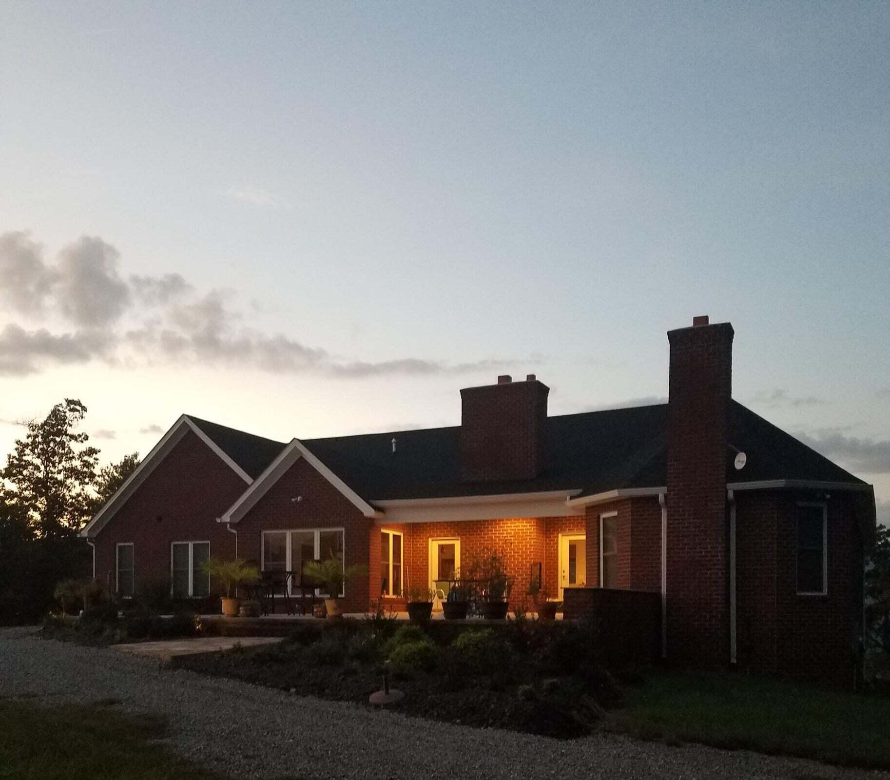 1202 Terrace Drive Salem, VA 24153 - Photo 11 of 44 a front view of house with yard and trees in the background