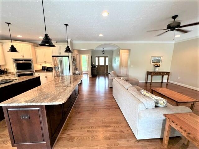 1202 Terrace Drive Salem, VA 24153 - Photo 17 of 44 a large center with kitchen island a counter space a sink appliances and living room view