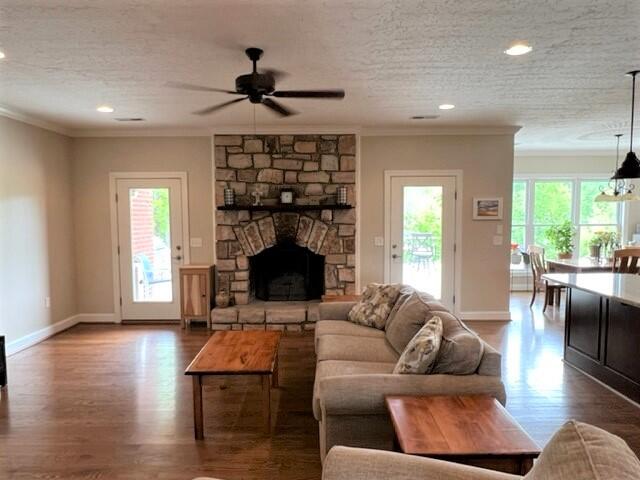 1202 Terrace Drive Salem, VA 24153 - Photo 23 of 44 a living room with furniture a fireplace and wooden floor