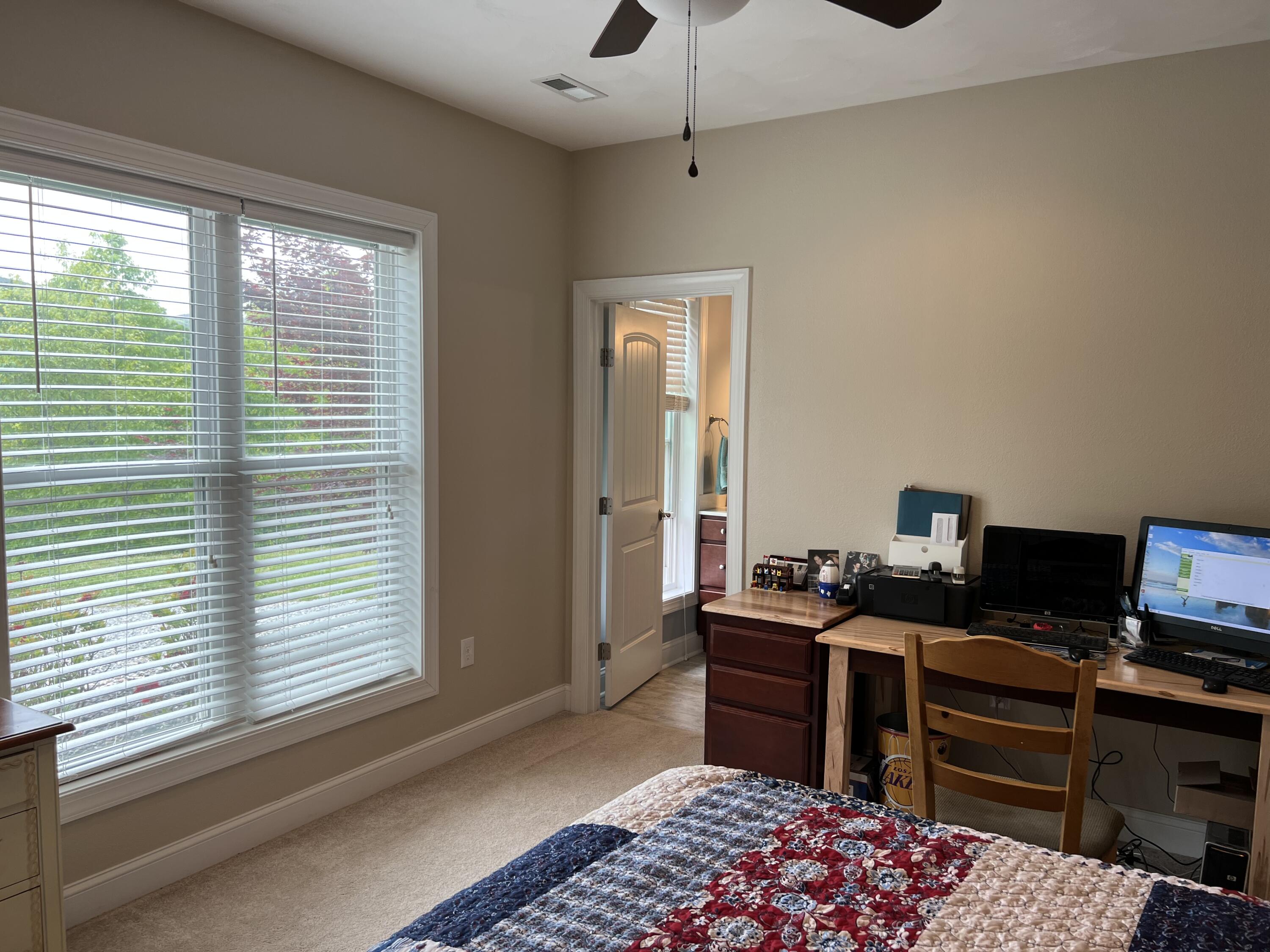 1202 Terrace Drive Salem, VA 24153 - Photo 25 of 44 a bedroom with a bed and a window