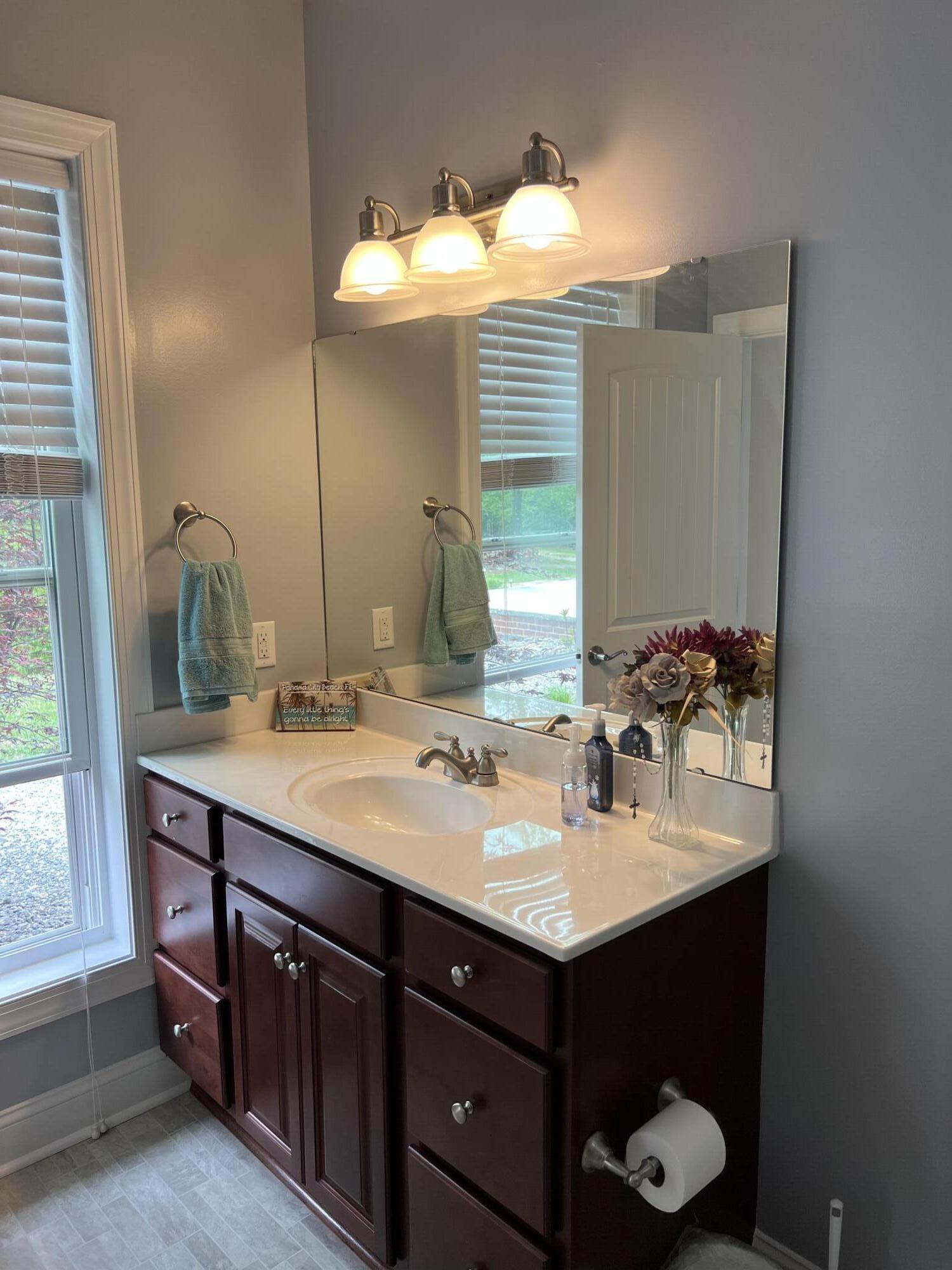 1202 Terrace Drive Salem, VA 24153 - Photo 27 of 44 a bathroom with a sink vanity and a mirror