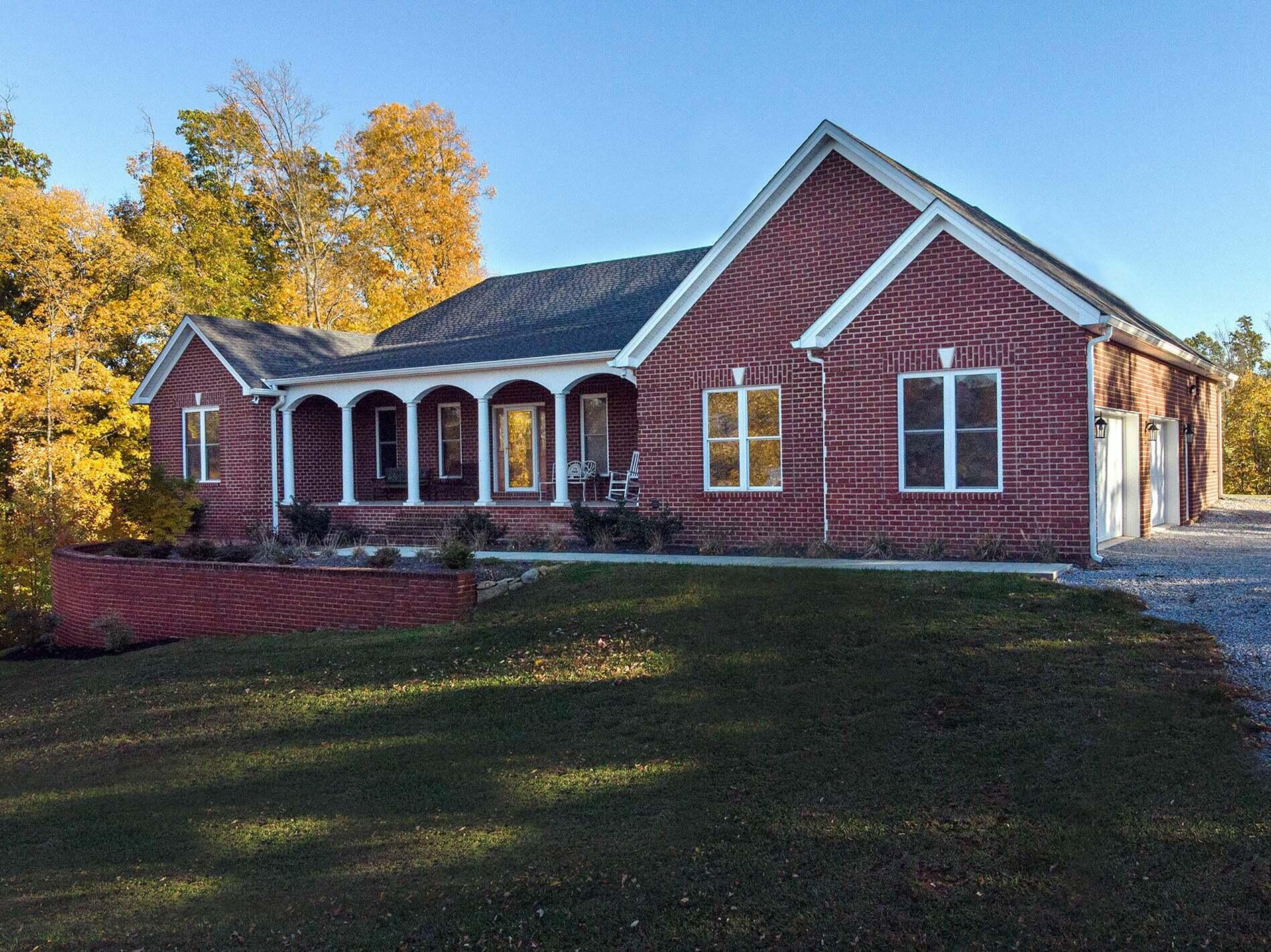 1202 Terrace Drive Salem, VA 24153 - Photo 4 of 44 a front view of a house with a garden