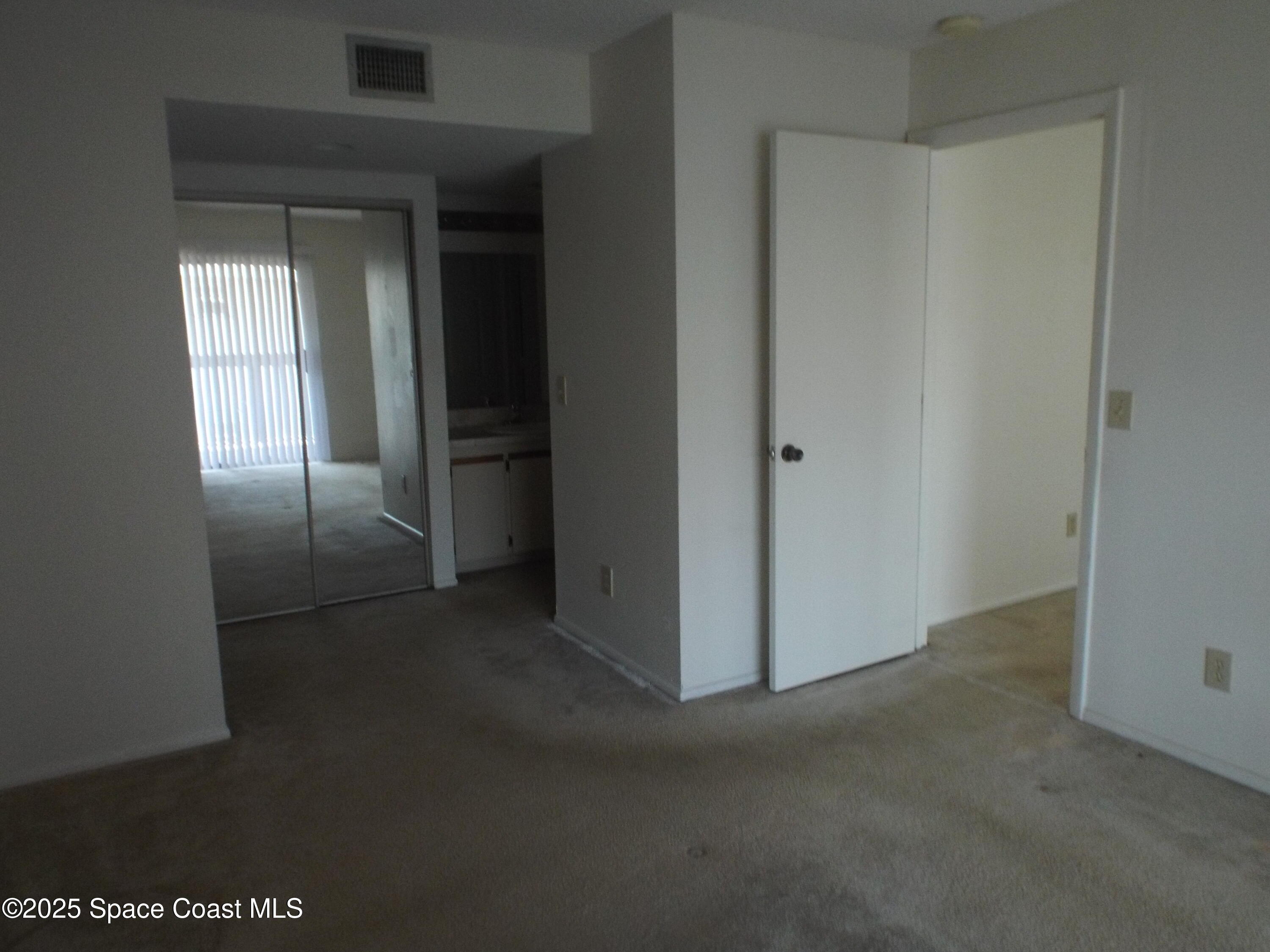 927 Sonesta Avenue Northeast, Unit 202 Palm Bay, FL 32905 - Photo 5 of 12 a view of empty room