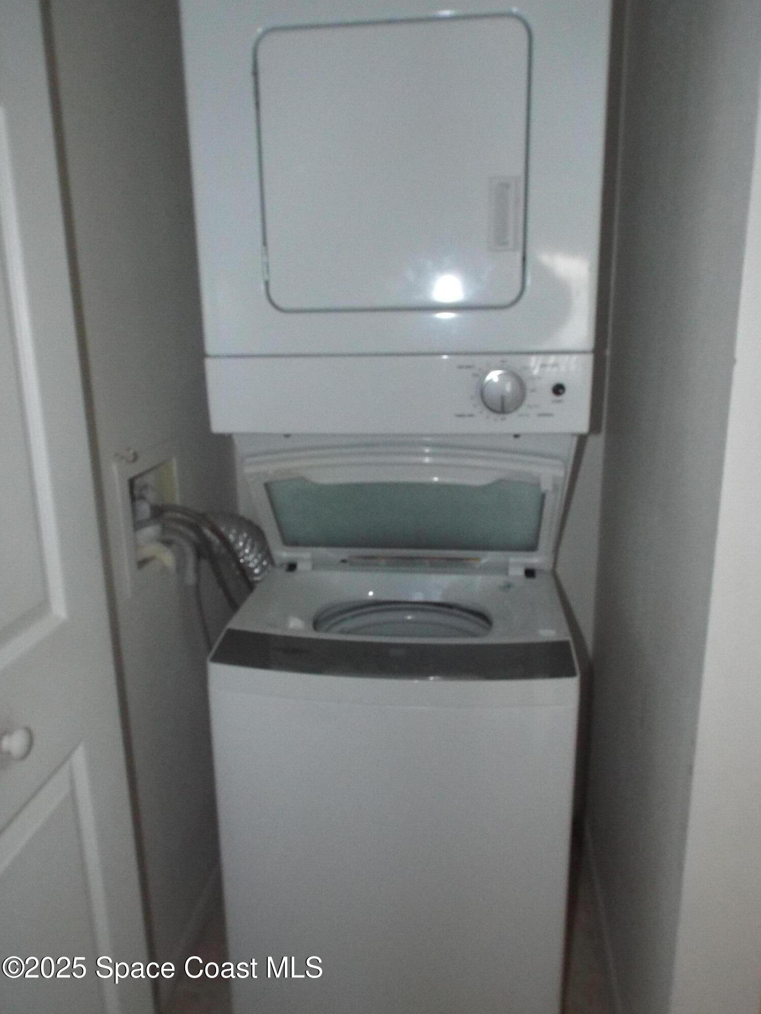 927 Sonesta Avenue Northeast, Unit 202 Palm Bay, FL 32905 - Photo 9 of 12 a view of washer and dryer