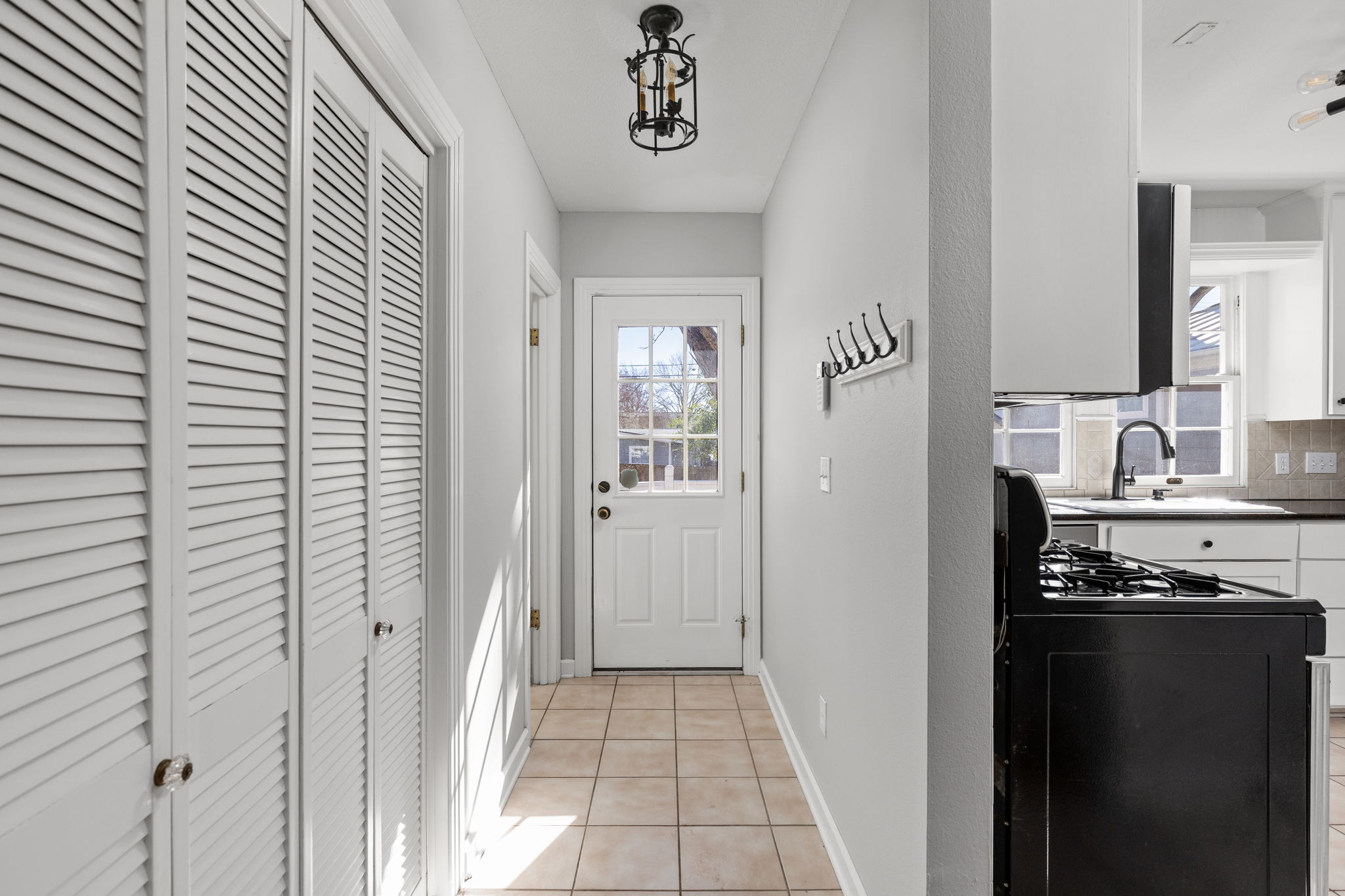 4517 Bull Creek Road Austin, TX 78731 - Photo 14 of 35 a view of a kitchen from the hallway