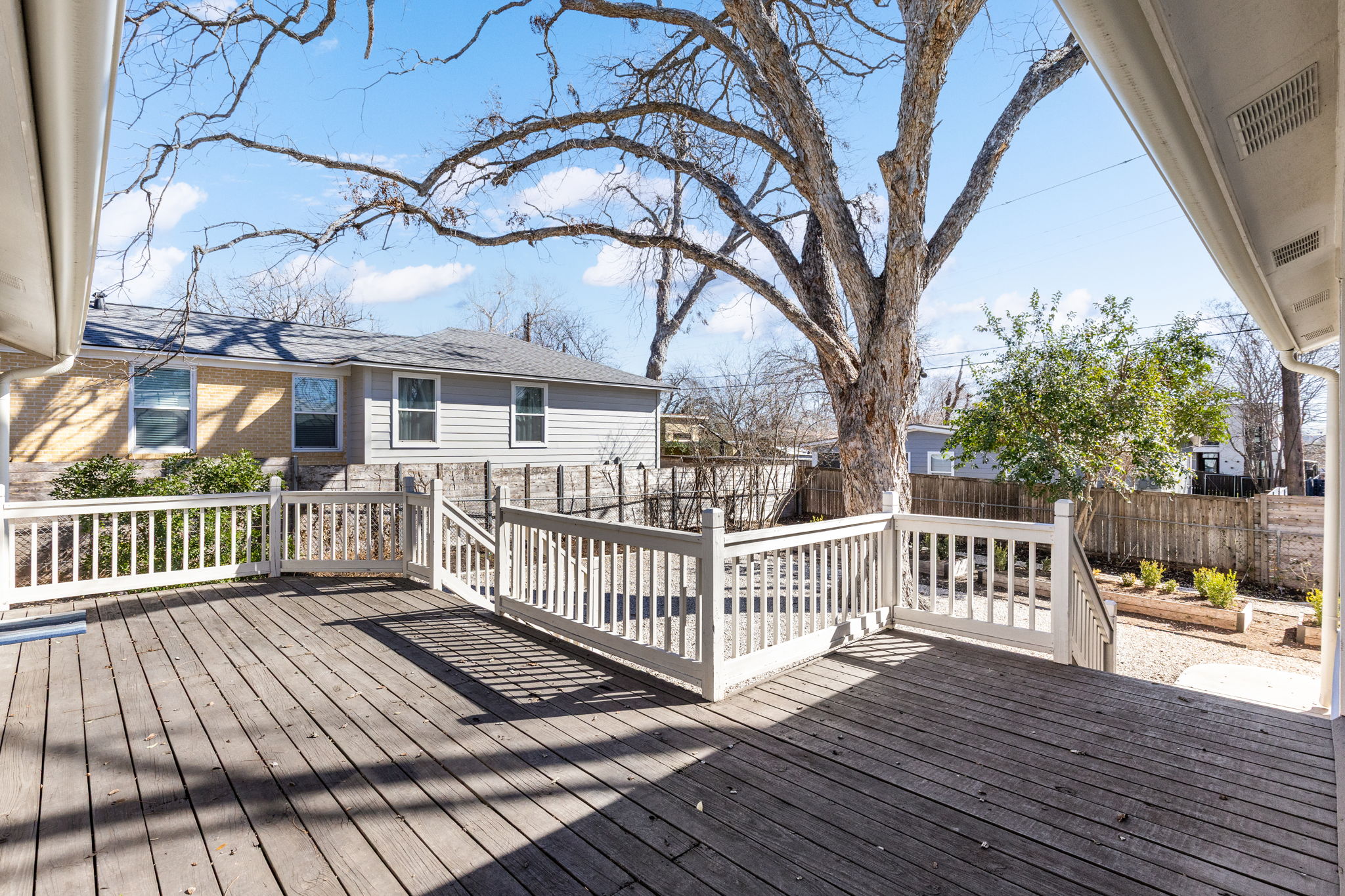 4517 Bull Creek Road Austin, TX 78731 - Photo 30 of 35 a view of a house with a deck