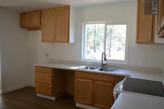a view of a entryway with wooden floor