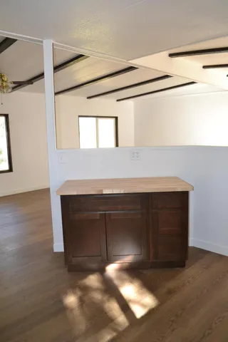 a bathroom with a bathtub and a toilet