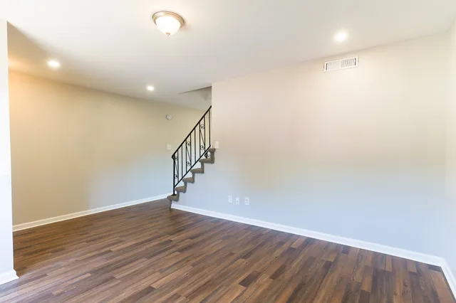 a view of entryway with wooden floor