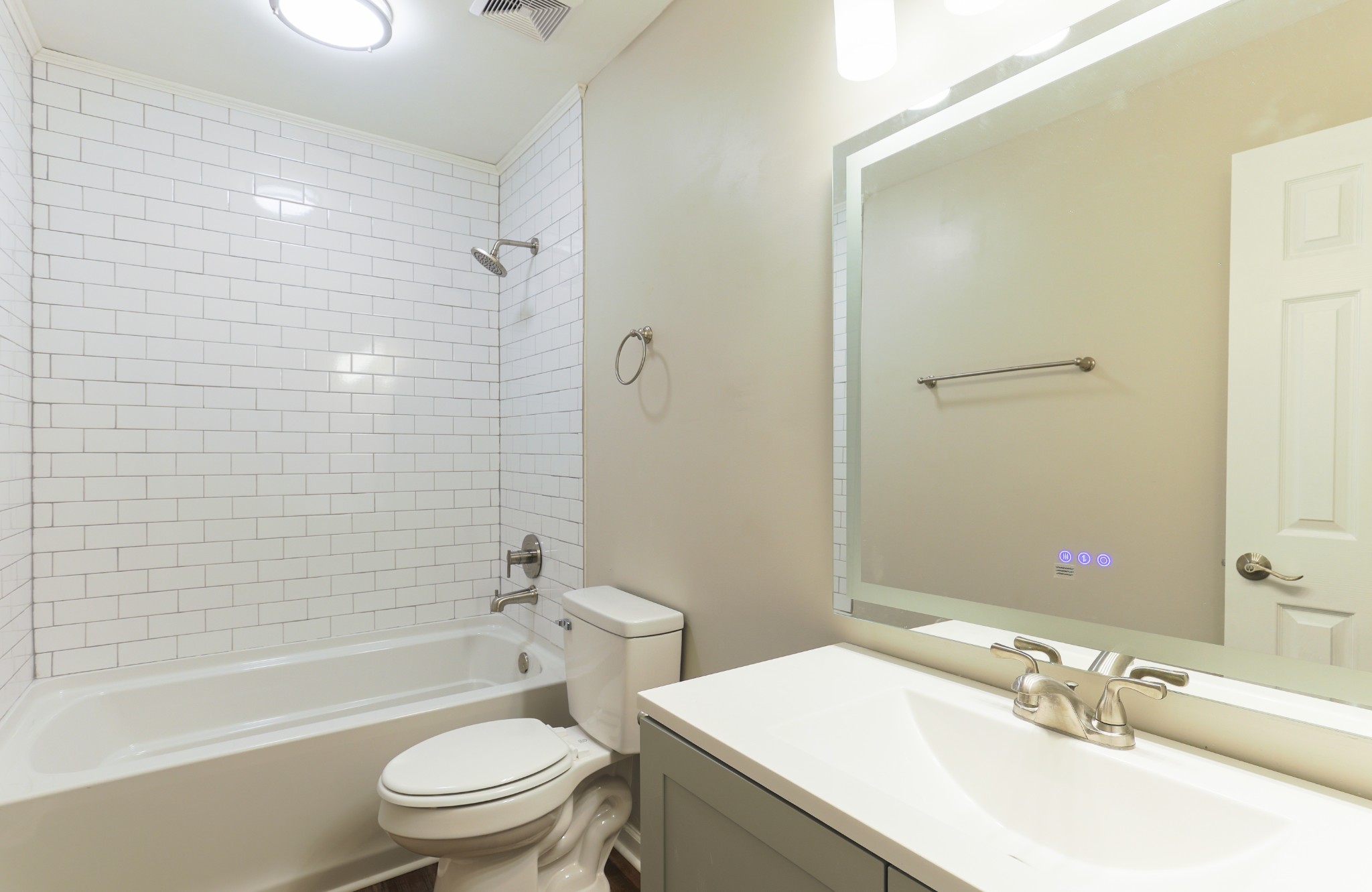 320 Welch Road, Unit L5 Nashville, TN 37211 - Photo 9 of 12 a bathroom with a sink a toilet and shower