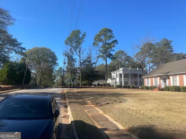 a outdoor view of a building with tree s