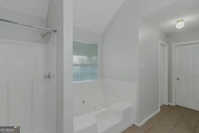 a bathroom with a bathtub