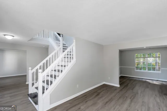 a view of entryway with wooden floor