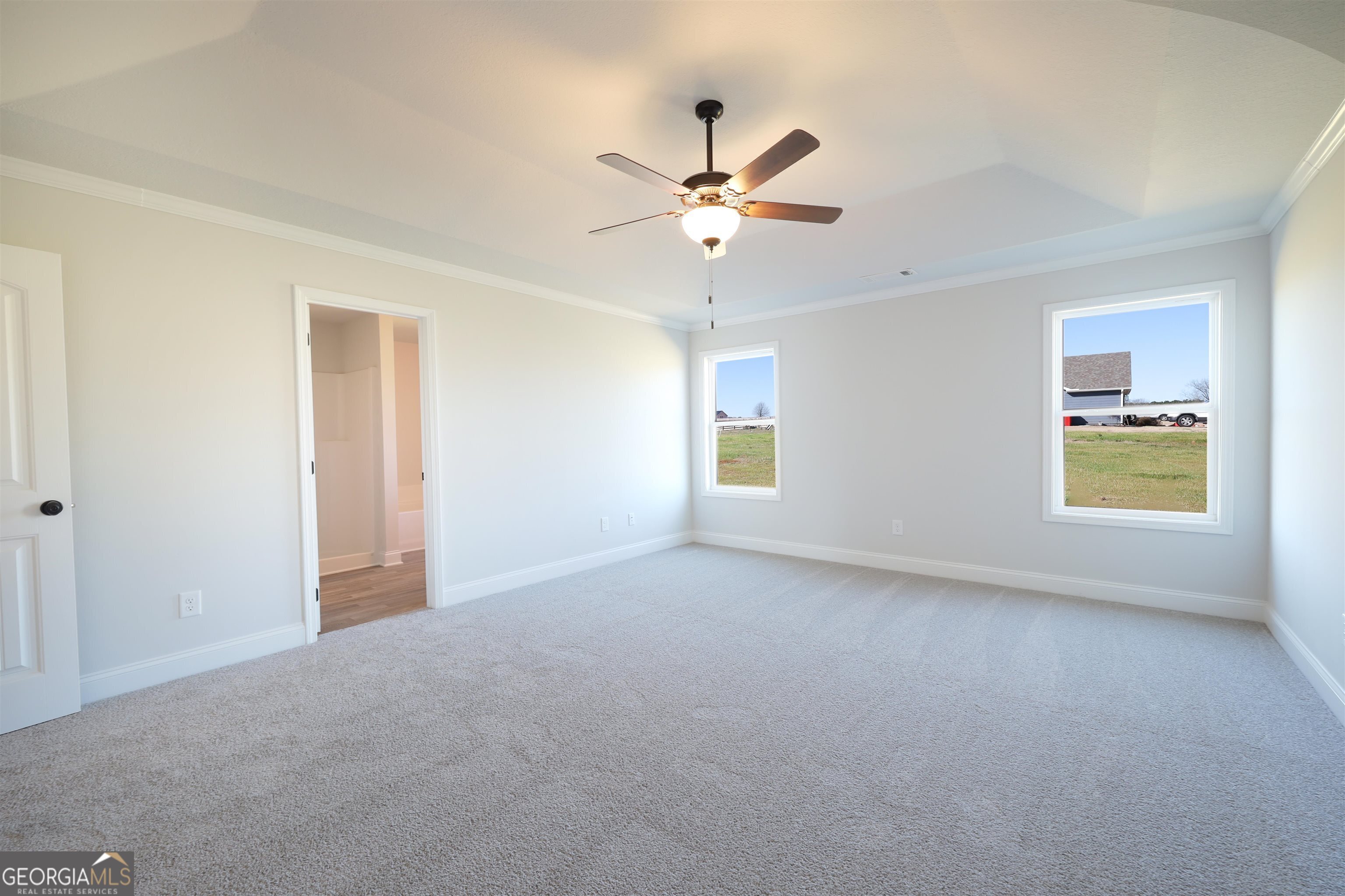 457 Tanners Bridge Circle, Unit 4 Bethlehem, GA 30620 - Photo 17 of 24 a view of an empty room with a window