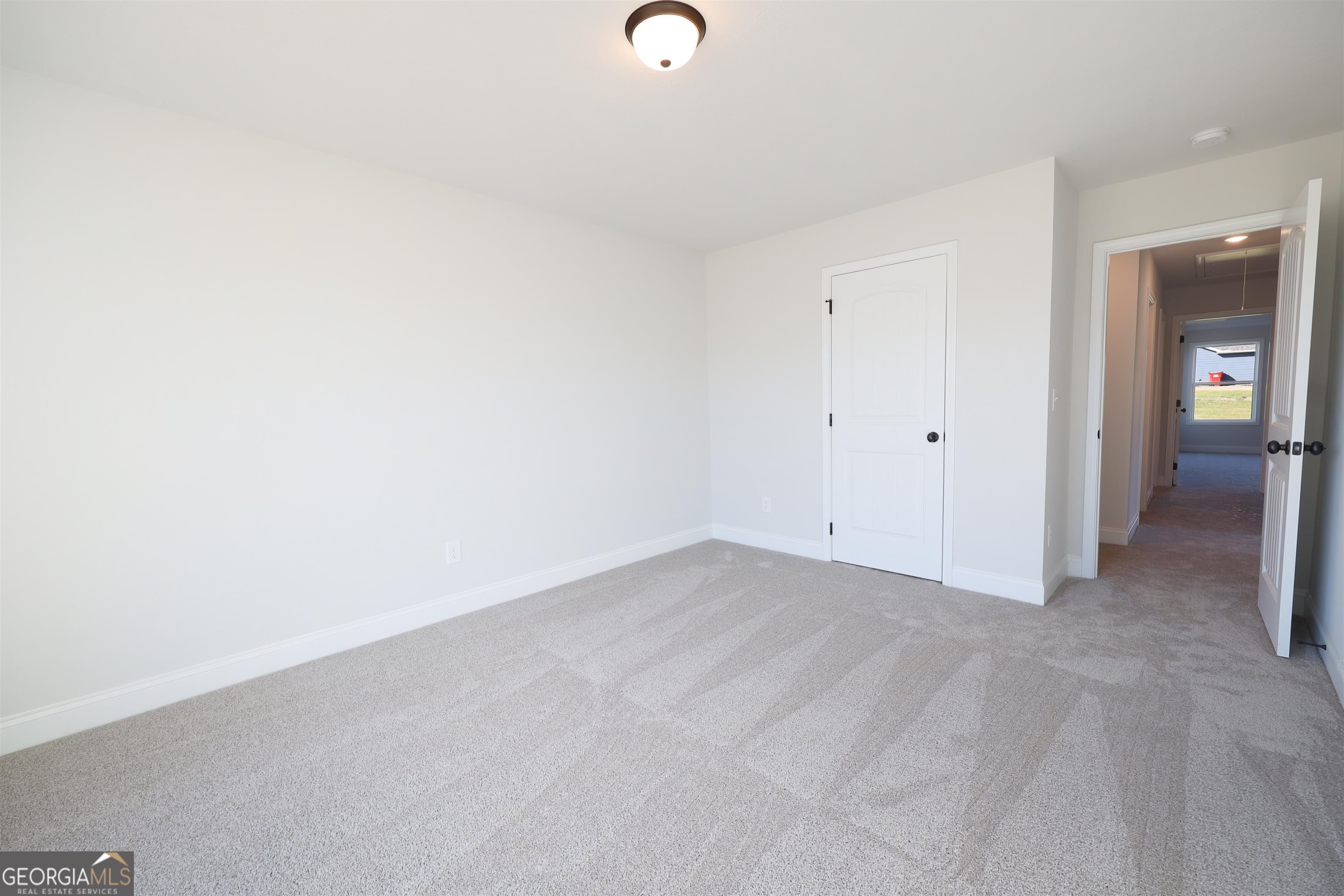 457 Tanners Bridge Circle, Unit 4 Bethlehem, GA 30620 - Photo 19 of 24 a view of an empty room