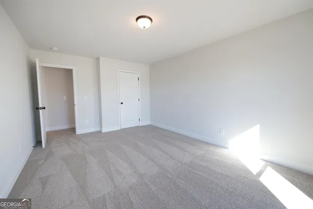 an empty room with an entryway