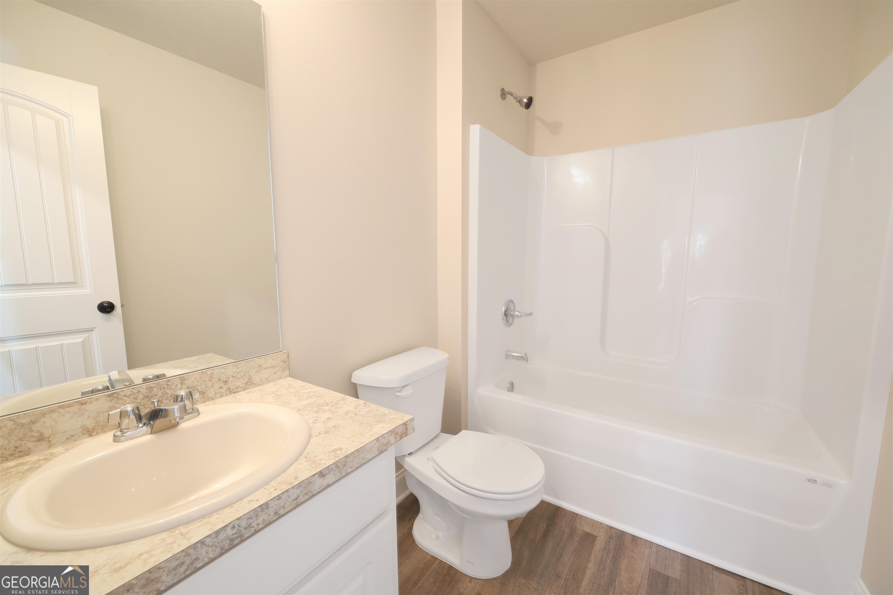 457 Tanners Bridge Circle, Unit 4 Bethlehem, GA 30620 - Photo 6 of 24 a bathroom with a sink toilet and shower