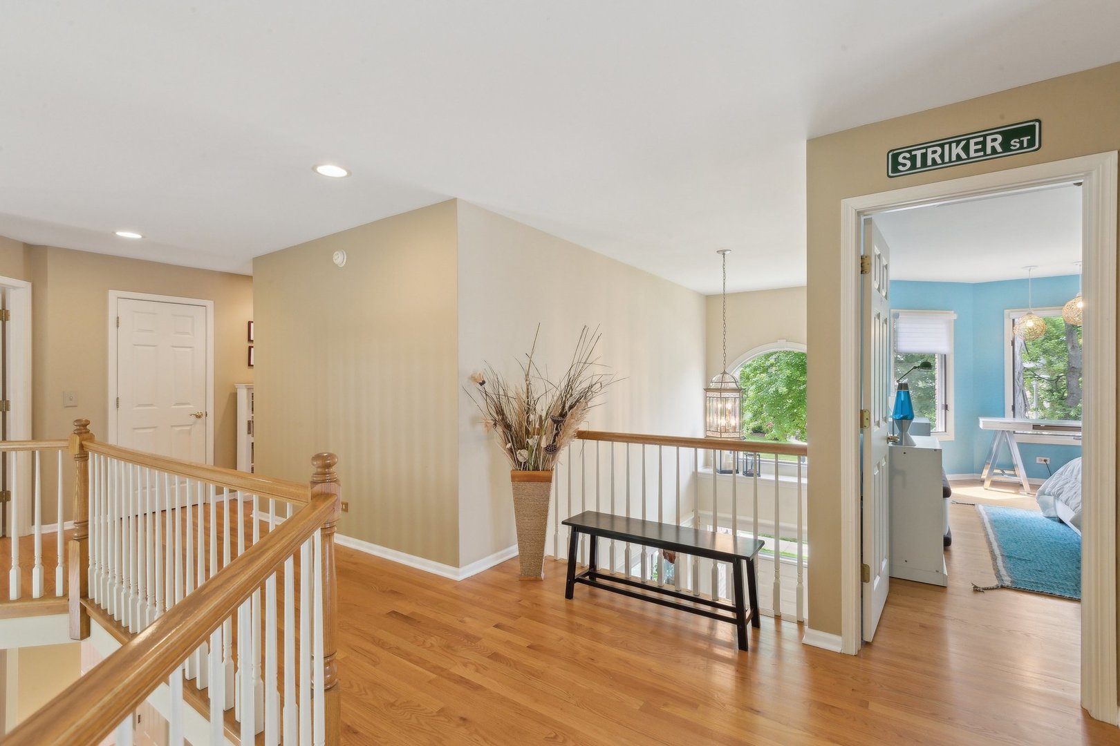 2156 Red Maple Lane Aurora, IL 60502 - Photo 31 of 57 a view of a hallway with wooden floor and windows