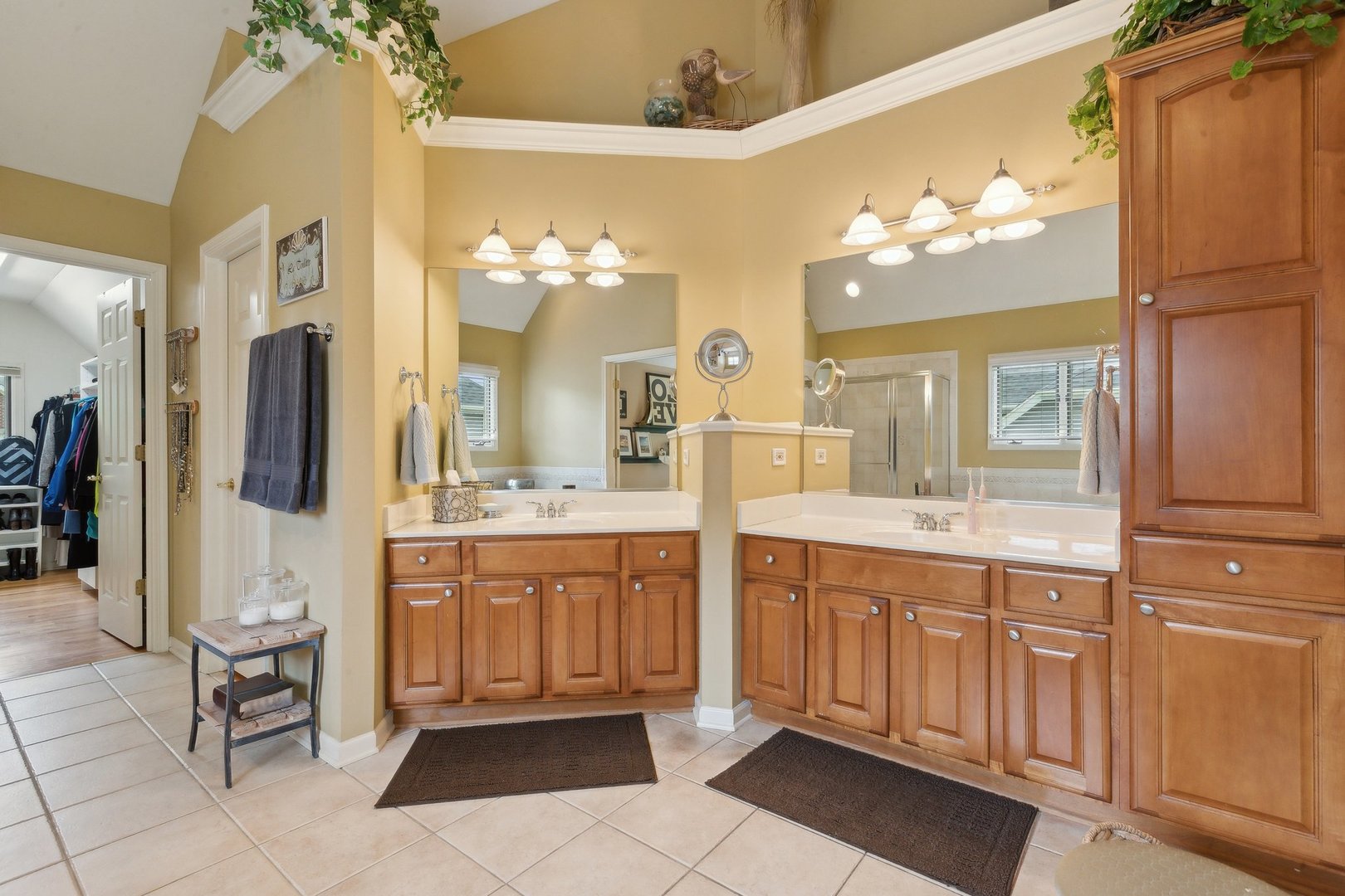 2156 Red Maple Lane Aurora, IL 60502 - Photo 37 of 57 a spacious bathroom with a granite countertop sink mirror and a bathtub