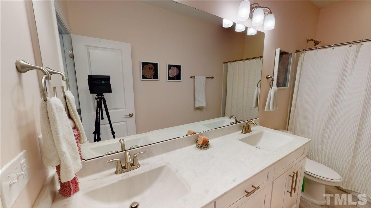 3116 Umstead View Drive Raleigh, NC 27607 - Photo 20 of 30 Elegant upstairs bathroom with two sinks!