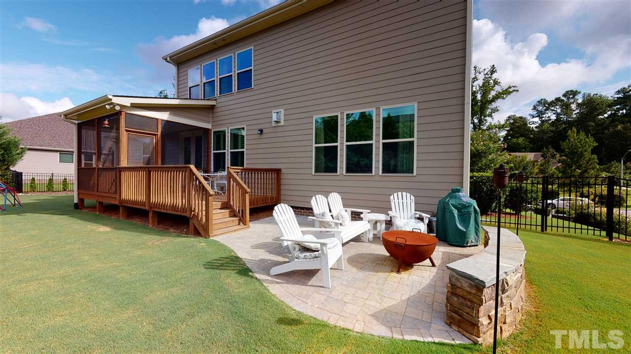 3116 Umstead View Drive Raleigh, NC 27607 - Photo 27 of 30 Screened porch, deck and patio make living out back easy as you have space to cook, entertain and play outside!