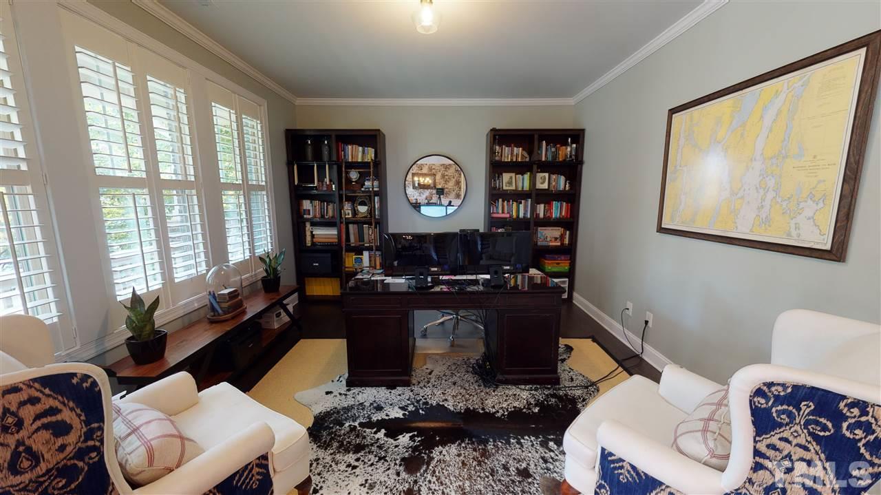 3116 Umstead View Drive Raleigh, NC 27607 - Photo 4 of 30 Dedicated downstairs home office perfect for today's needs! Shutters and view of the rocking chair front porch from your windows!