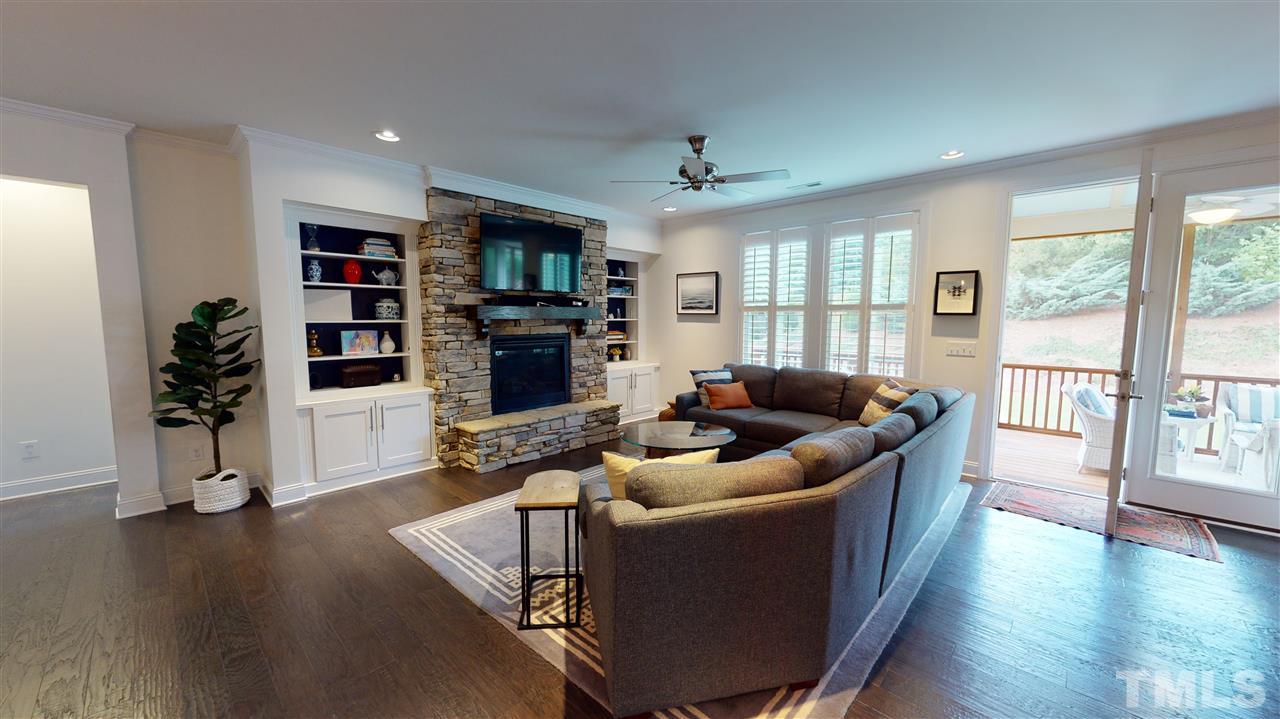 3116 Umstead View Drive Raleigh, NC 27607 - Photo 10 of 30 Generous sized living room makes the indoor/outdoor living space easy!