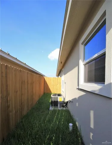 a kitchen with stainless steel appliances granite countertop a refrigerator a sink and a stove