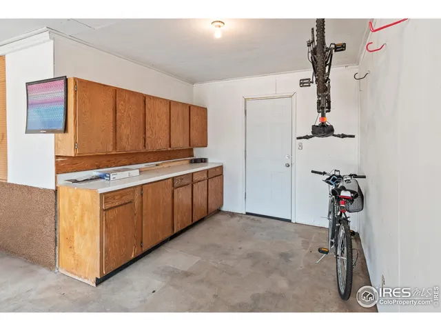 a view of a kitchen with electric appliances