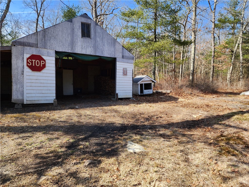 18 Isthmus Road Foster, RI 02825 - Photo 29 of 34 Wood shed has electric & woodstove