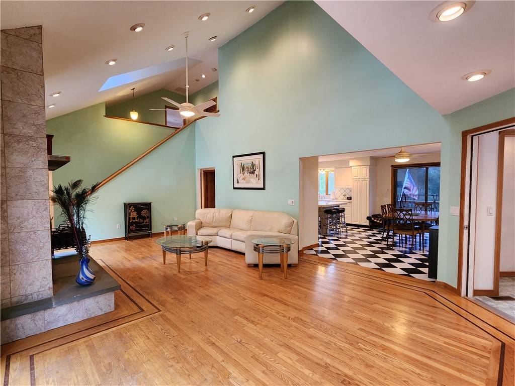 18 Isthmus Road Foster, RI 02825 - Photo 8 of 34 Living Room Vaulted ceilings, recessed lighting, gorgeous hardwoods throught the home!