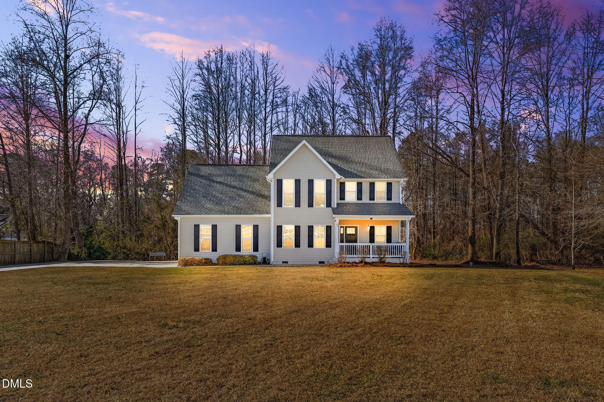 27 Duchess Court Angier, NC 27501 - Photo 1 of 50 a front view of residential houses with yard and trees in the background