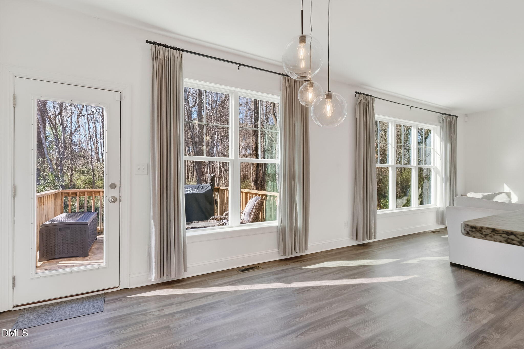 27 Duchess Court Angier, NC 27501 - Photo 11 of 50 a view of a livingroom with a ceiling fan and window