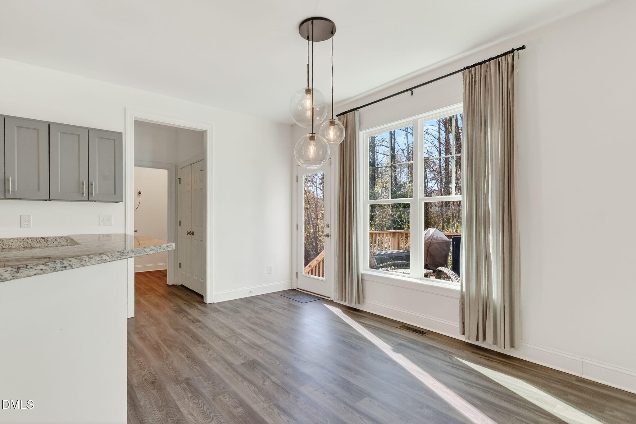 27 Duchess Court Angier, NC 27501 - Photo 12 of 50 a view of a room with wooden floor and a window