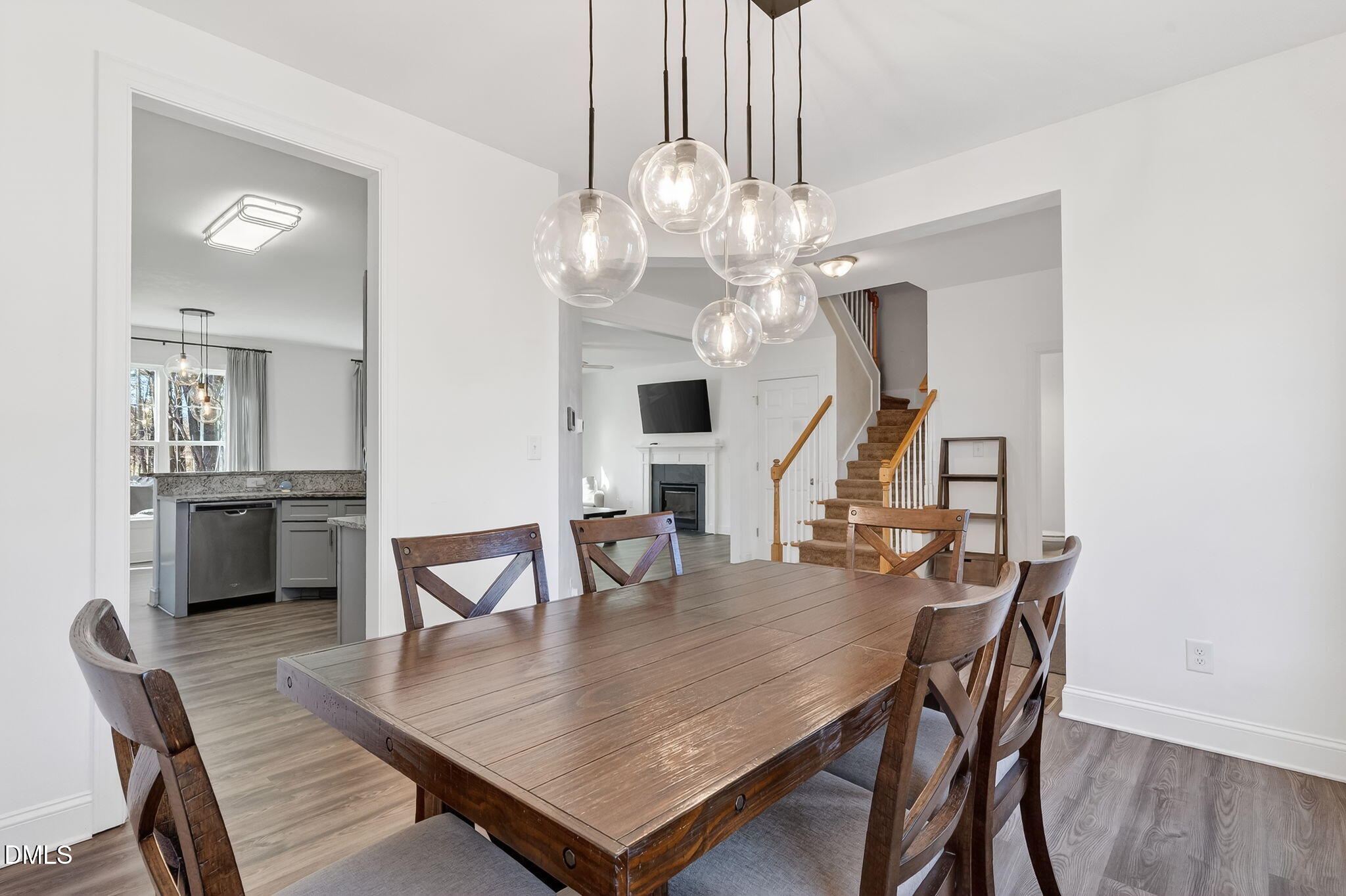 27 Duchess Court Angier, NC 27501 - Photo 15 of 50 a view of a dining room with furniture and wooden floor